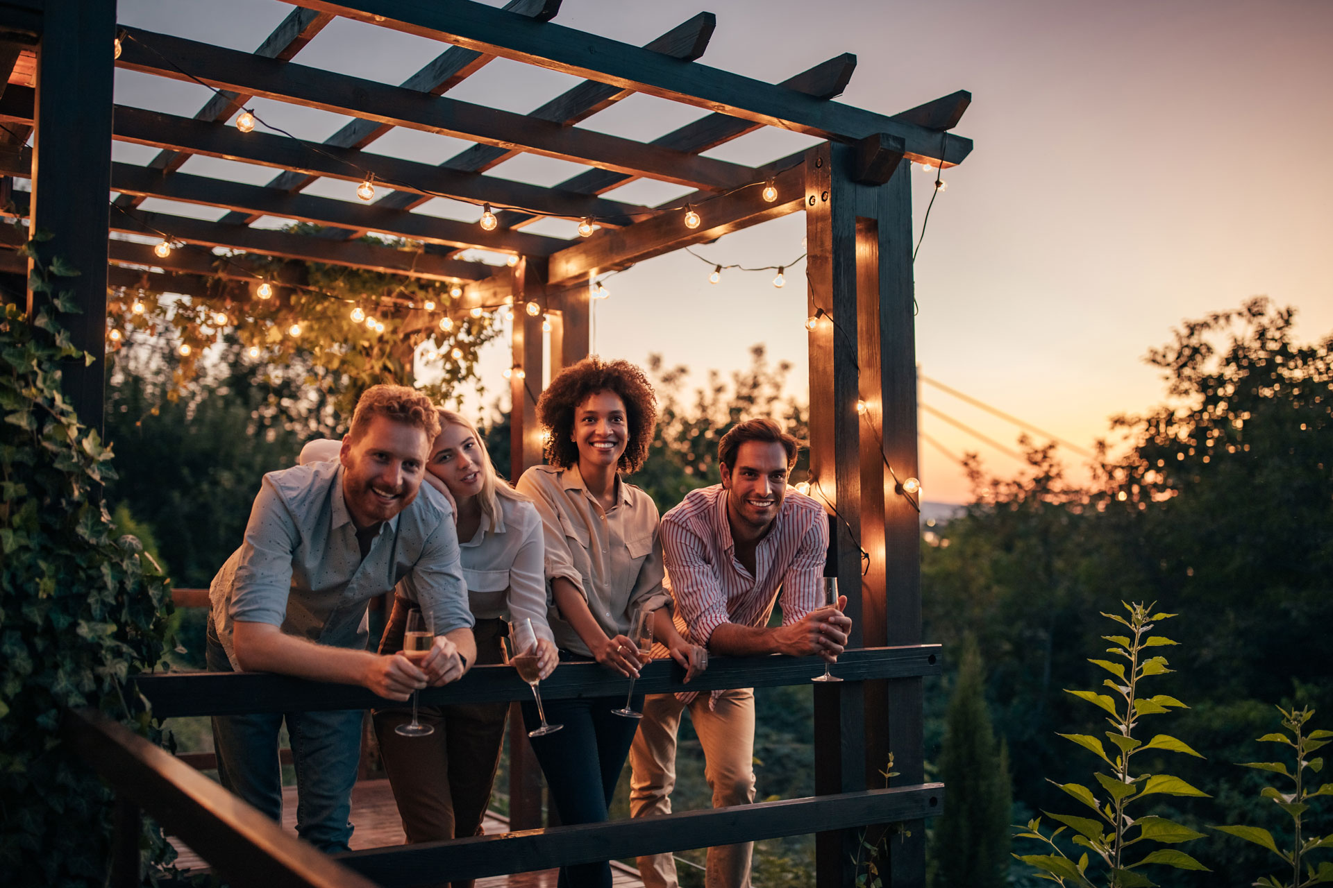 A friend group on the porch with pergola.