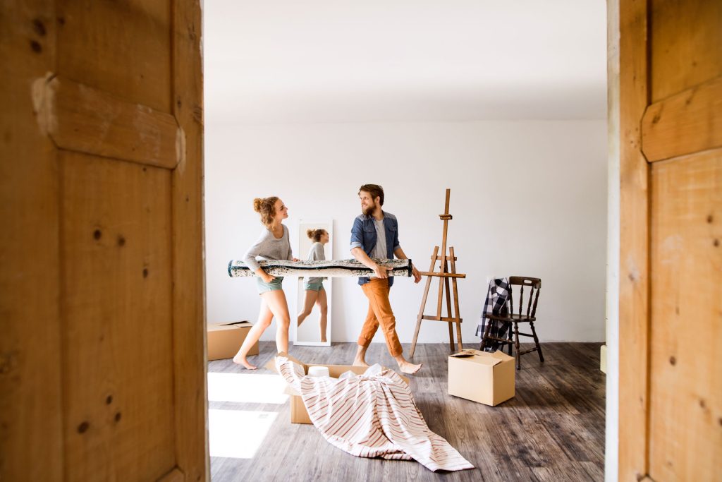 Young couple doing home renovation.